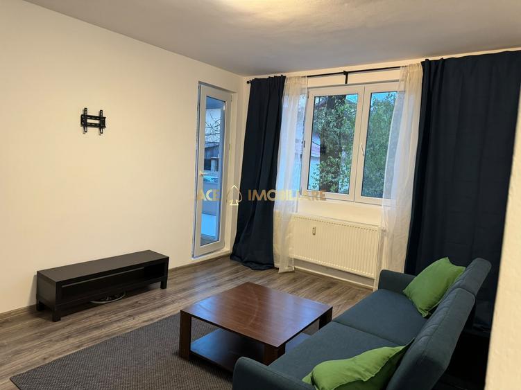 Apartament cu 3 camere semidecomandat, mobilat în Titan