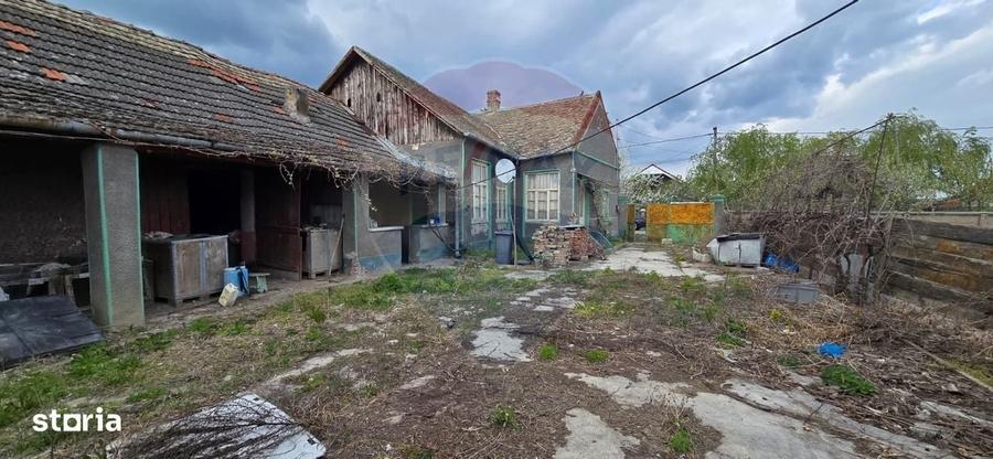 Casă cu 3 camere cu Teren 936 Mp în Socodor