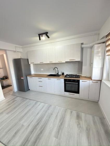 Apartament cu 2 camere semidecomandat, mobilat în Central