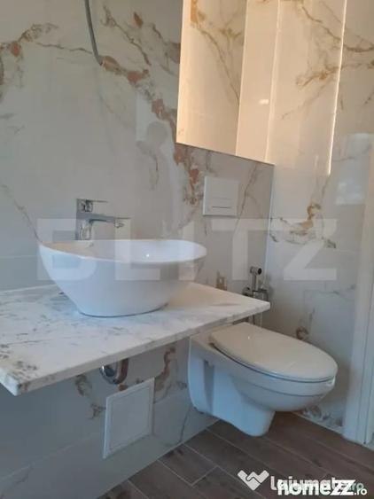 Apartament cu 3 camere decomandat în Tractorul