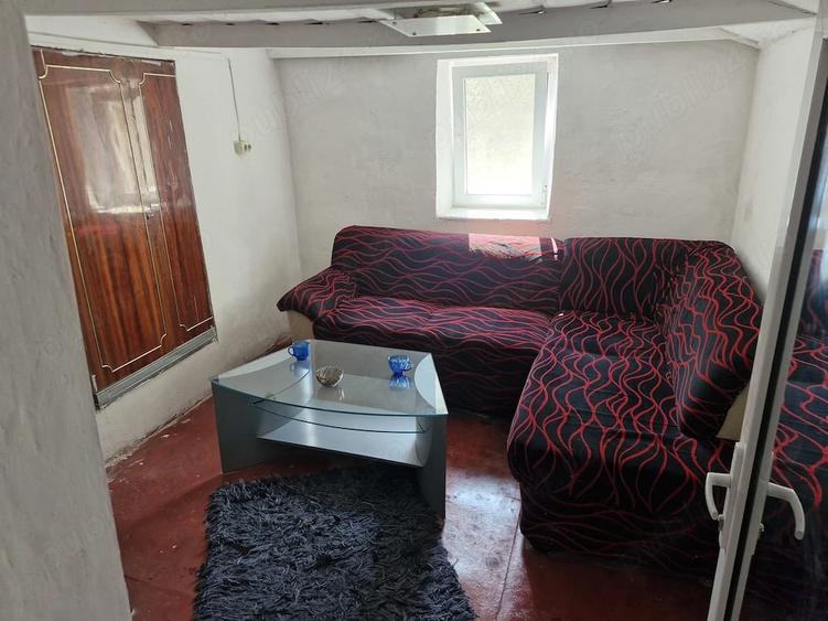 Casă cu Teren 1500 Mp în Tortoman