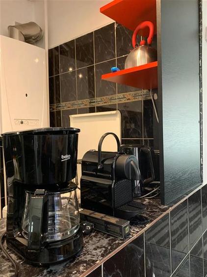 Apartament cu 2 camere semidecomandat, mobilat în Centrul Istoric