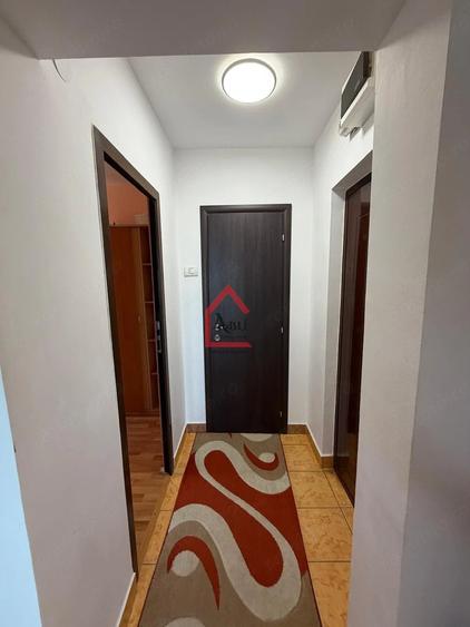 Apartament cu 3 camere decomandat în Filiași