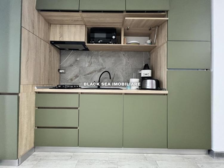Apartament cu 2 camere, mobilat în Central
