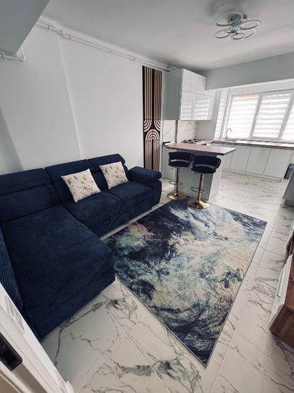 Apartament cu 2 camere semidecomandat, mobilat în Central