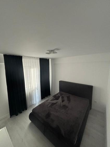 Apartament cu 3 camere decomandat în Cățelu