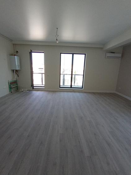 Exclusiv - Apartamente finalizate 2 camere și 3 camere -Loc parcare - 12