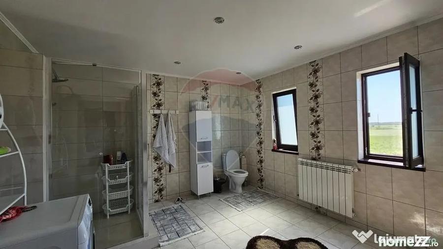 Casă cu 6 camere cu Teren 3600 Mp în Hănțești