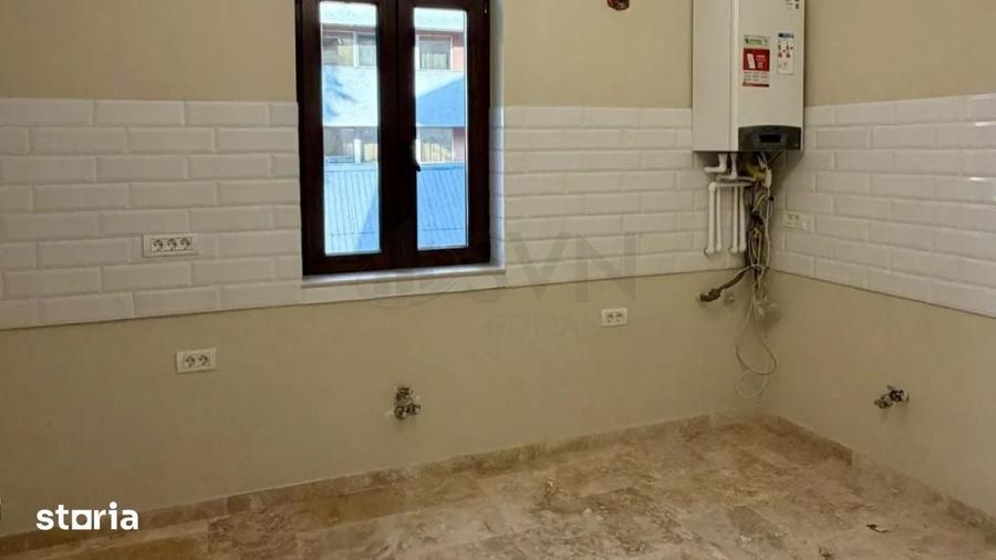 Apartament cu 4 camere în Romană