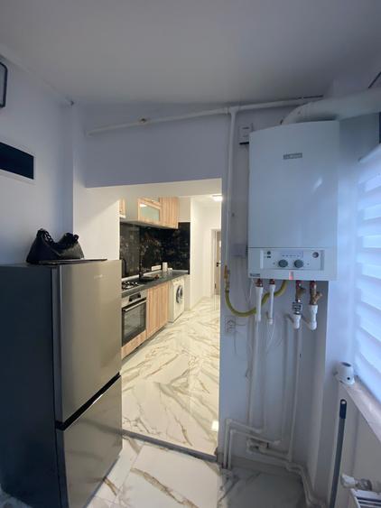 Apartament cu 2 camere decomandat, mobilat în Central