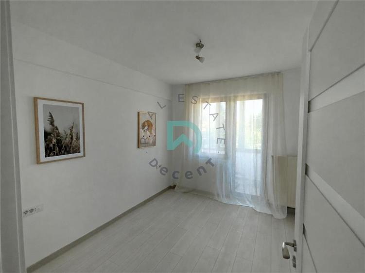 Apartament cu 3 camere decomandat în Tractorul