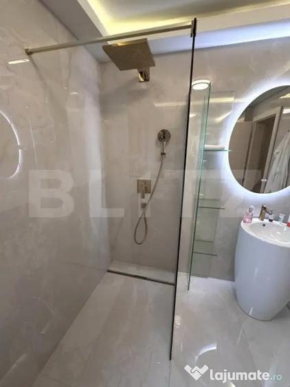 Apartament de lux,2 camere,2 bai,bloc nou,parter +parcare p - 12