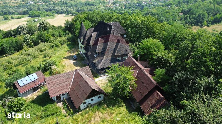 Casă cu Teren 24700 Mp în Copalnic