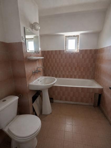 Apartament cu 4 camere decomandat în Central