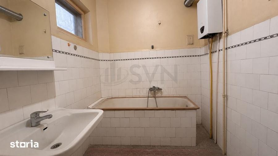 Casă cu 8 camere cu Teren 100 Mp în Centrul Civic