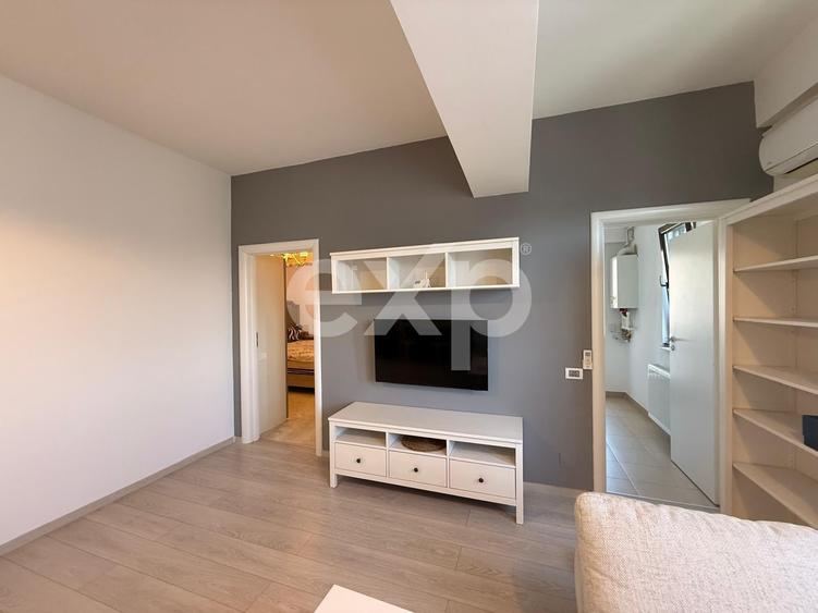 Apartament cu 2 camere semidecomandat, mobilat în Central