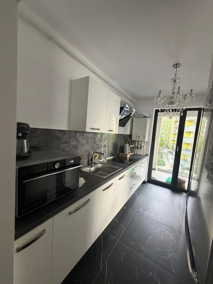 Apartament cu 2 camere decomandat în Tractorul — fotografia 3