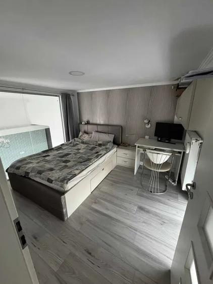 Apartament cu 3 camere semidecomandat, mobilat în Central