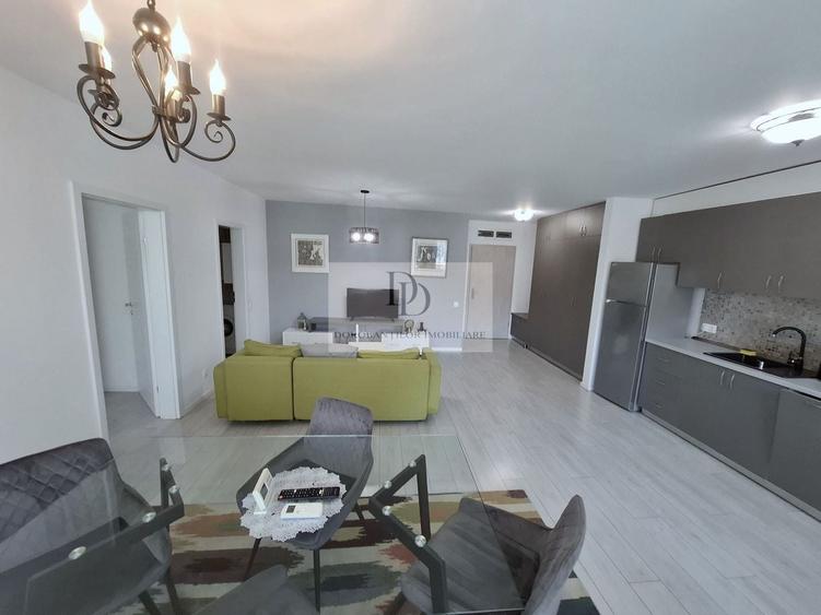 Apartament cu 2 camere semidecomandat, mobilat în Borhanci