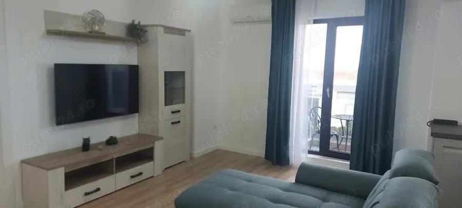 Apartament cu 2 camere semidecomandat, mobilat în Central