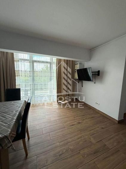 Apartament cu 2 camere semidecomandat, mobilat în Ghiroda