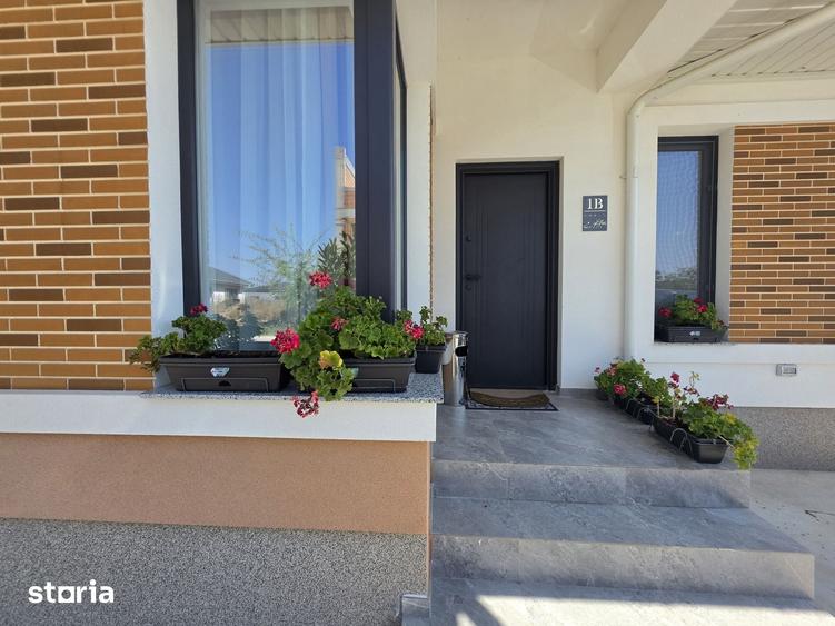 Casă cu 4 camere cu Teren 500 Mp în Tunari