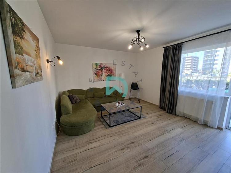 Apartament cu 3 camere decomandat în Tractorul