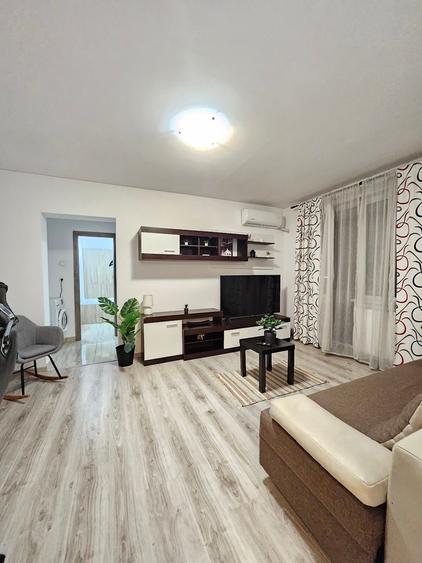 Apartament cu 2 camere semidecomandat, mobilat în Central