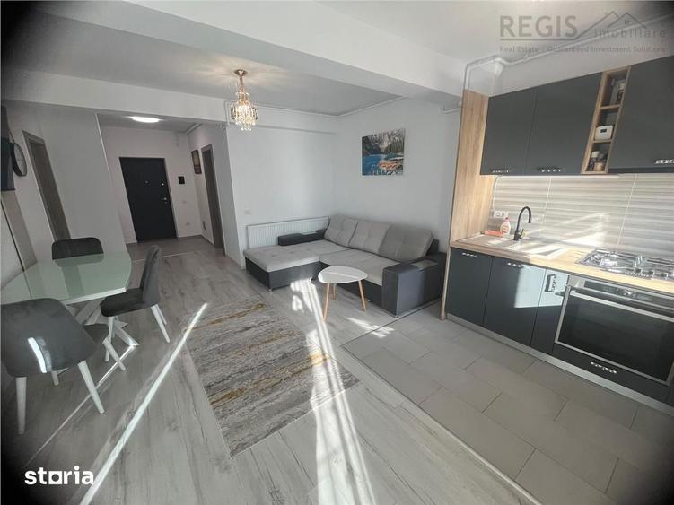 Apartament cu 2 camere semidecomandat, mobilat în Tractorul