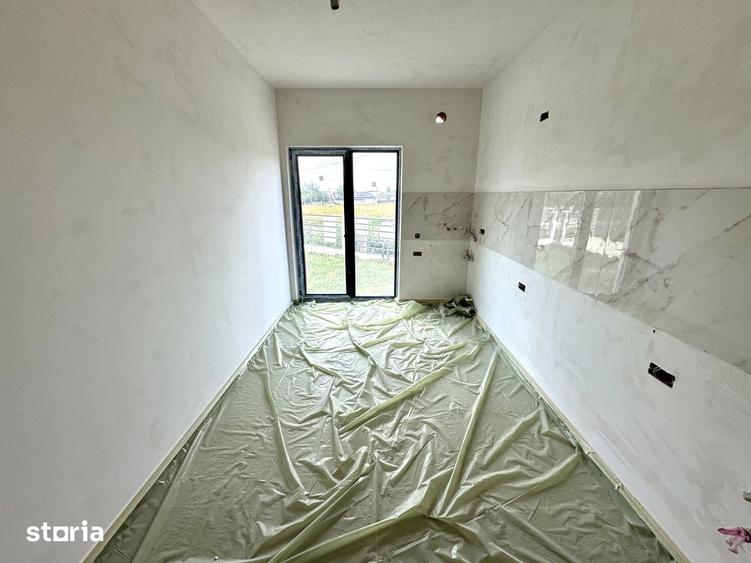 Casă cu 4 camere cu Teren 200 Mp în Holboca