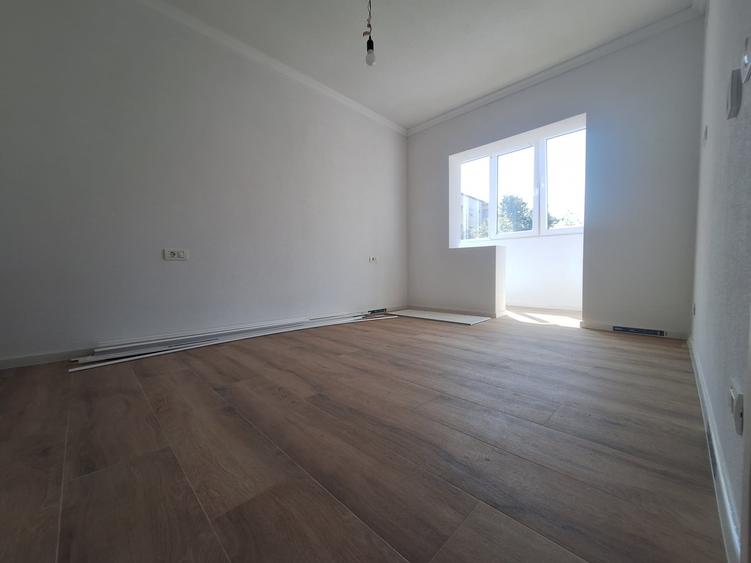 Apartament cu 3 camere decomandat în Dâmbovița