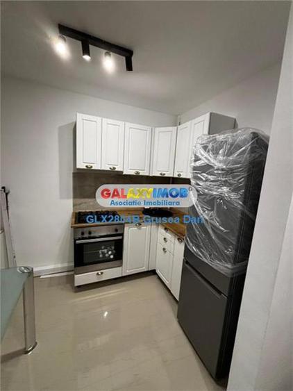 Apartament cu 2 camere semidecomandat, mobilat în Central