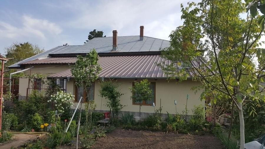 Casă cu 4 camere în Ion Roată