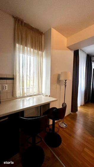 Apartament cu 2 camere semidecomandat, mobilat în Eminescu