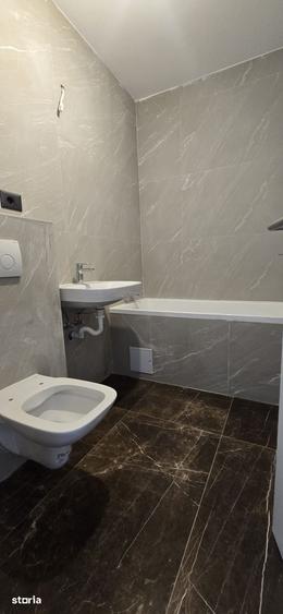 Apartament cu 3 camere în Tractorul
