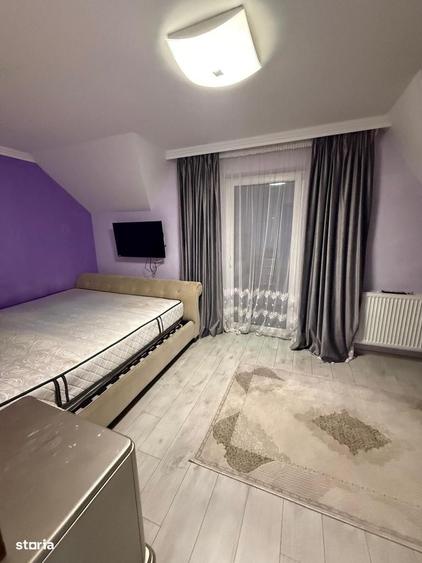 INTRARE IN IPOTESTI: Casa tip duplex P+M - 10