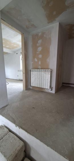 Casă individuală cu 4 camere cu Teren 400 Mp în Bucium