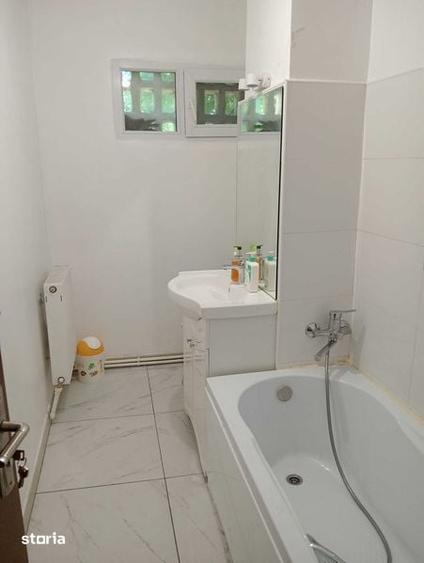 Apartament cu 2 camere semidecomandat în Podu Roș