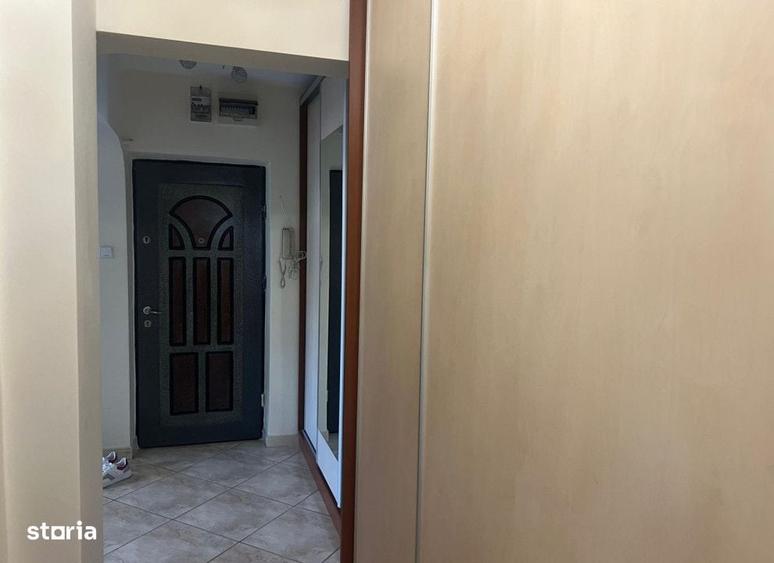 Apartament cu 3 camere decomandat în Podul de Fier