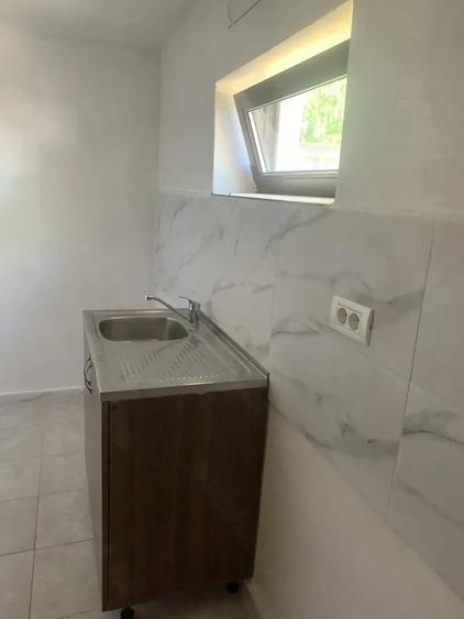 Casă cu 2 camere cu Teren 500 Mp în Central