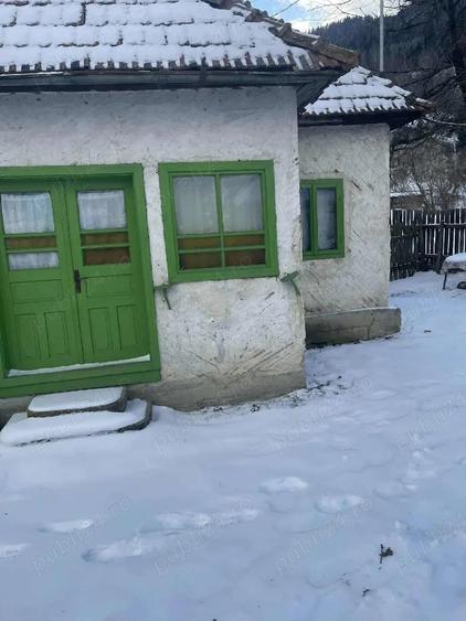 Casă în Ghimeș