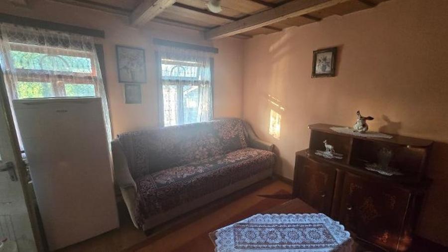 Casă cu 2 camere cu Teren 4000 Mp în Băbiceni