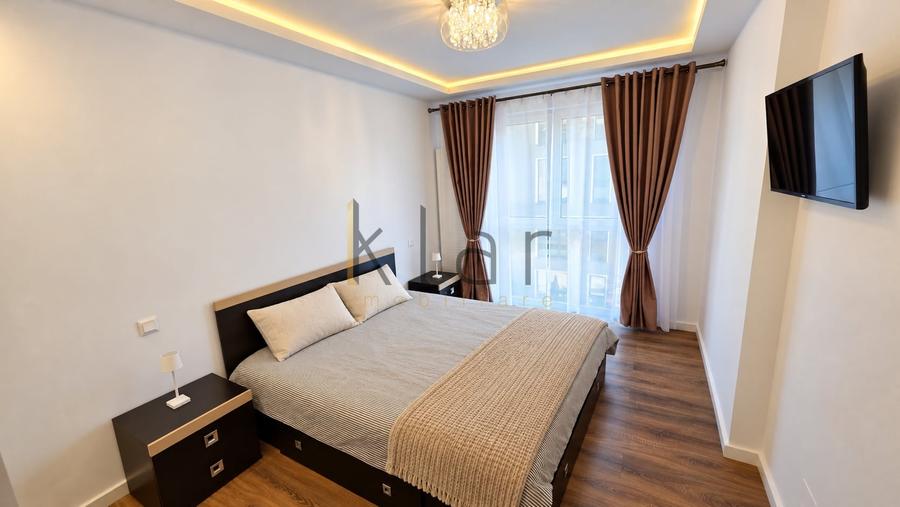 Apartament cu 2 camere semidecomandat, mobilat în Central