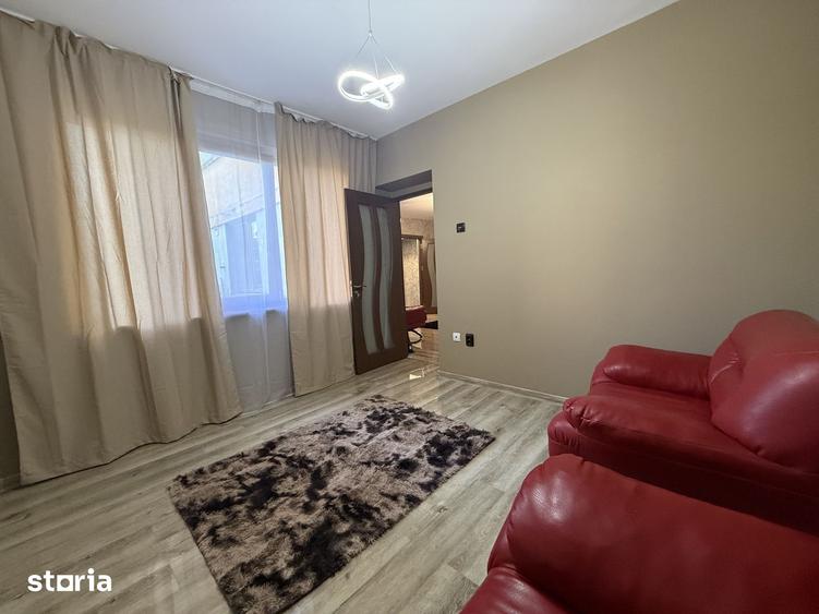 Apartament cu 3 camere semidecomandat în Calea București
