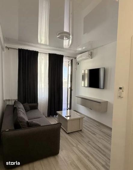 Apartament cu 2 camere, mobilat în Central