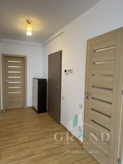 Apartament cu 2 camere semidecomandat, mobilat în Borhanci