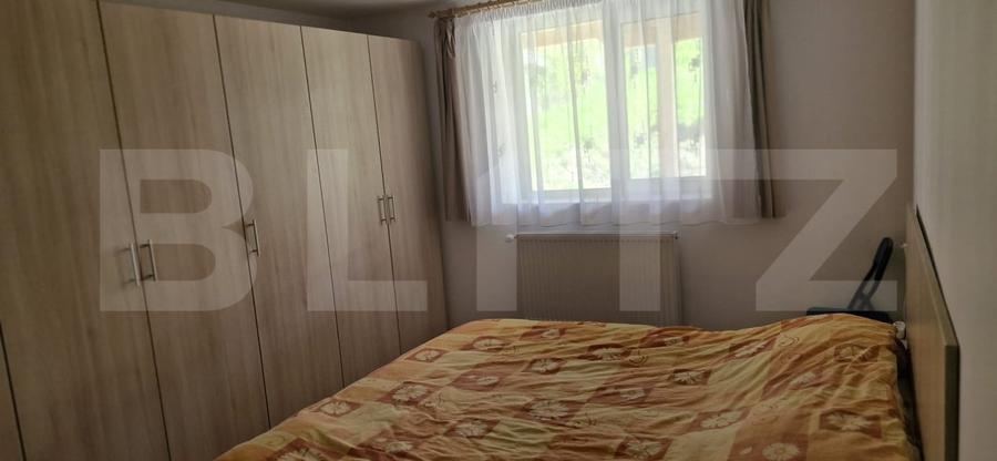 Casă individuală cu 9 camere cu Teren 1000 Mp în Pucioasa
