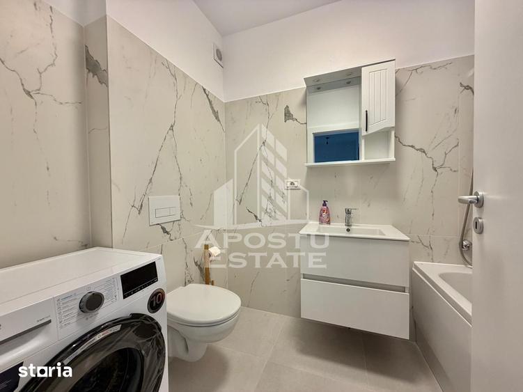 Apartament cu 2 camere, mobilat în Est