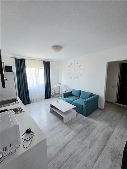 Apartament cu 3 camere semidecomandat, mobilat în Inel II
