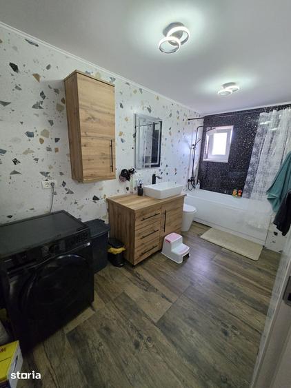 Casă cu 4 camere cu Teren 1014 Mp în Moșoaia